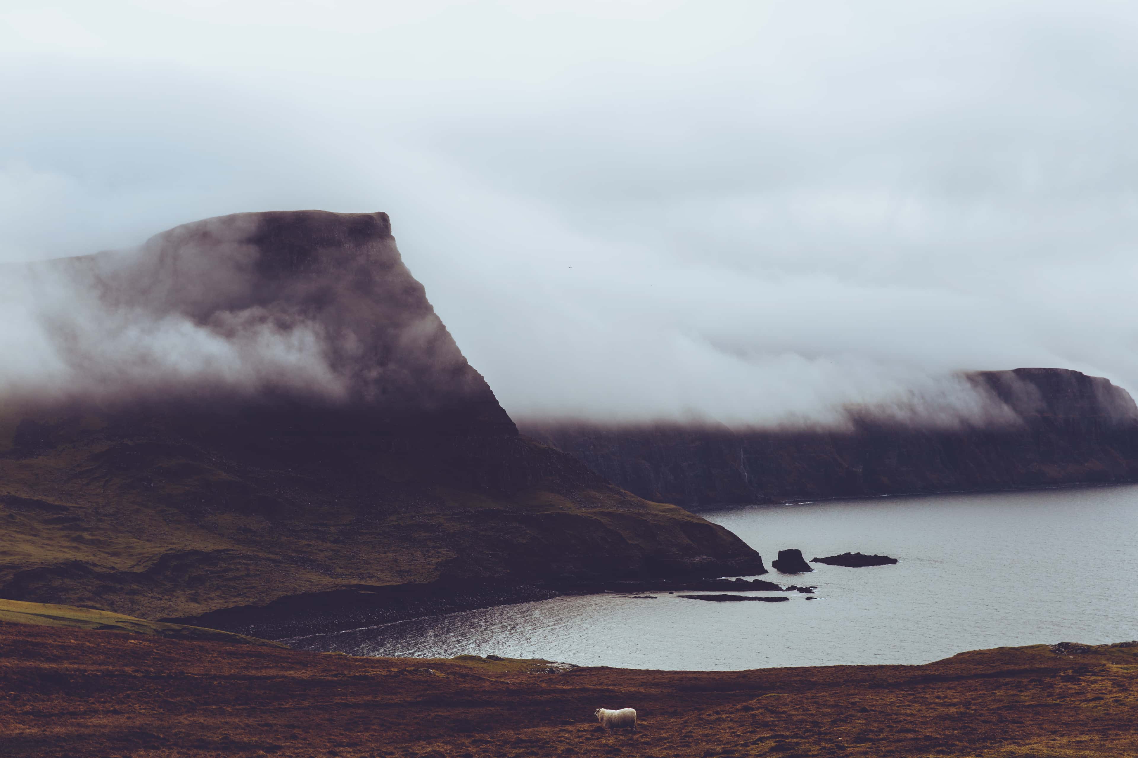 Misty cloud on coast of Isle of Skye Scotland